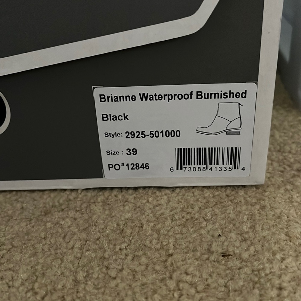 Dansko Brianne Black booties.